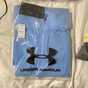 New in wrapper. XL under armour golf pullover